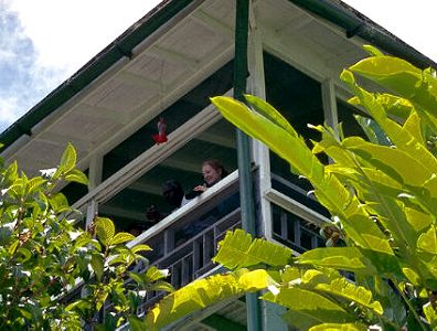 Pam and local resident on the veranda